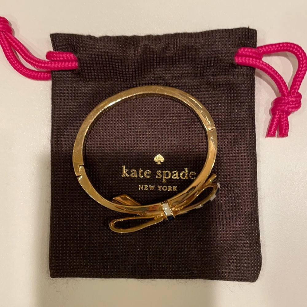 Kate Spade navy and white striped bow bangle.